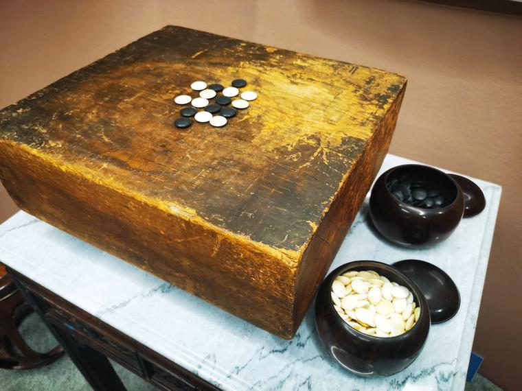 成语智慧对决棋盘间,棋子流转妙趣横生探围棋融文化深度与智慧博弈,成语携历史韵味显魅力